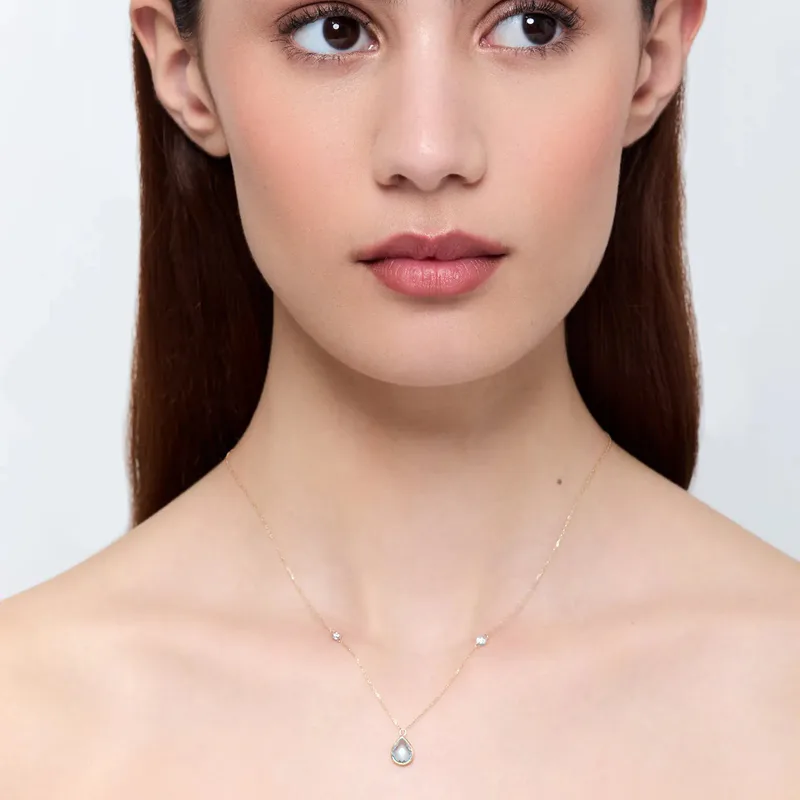 14kt Blue Topaz Pear and Diamond Bezel Necklace