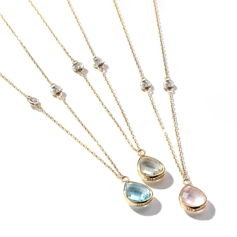 14kt Blue Topaz Pear and Diamond Bezel Necklace