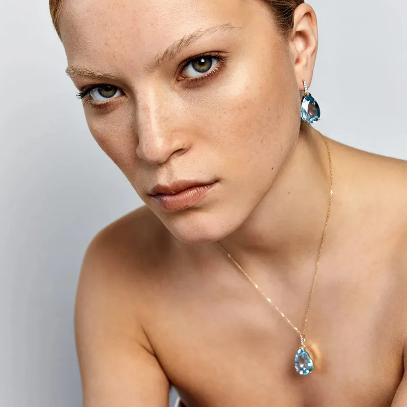 14kt Swiss Blue Topaz Pear drop earrings
